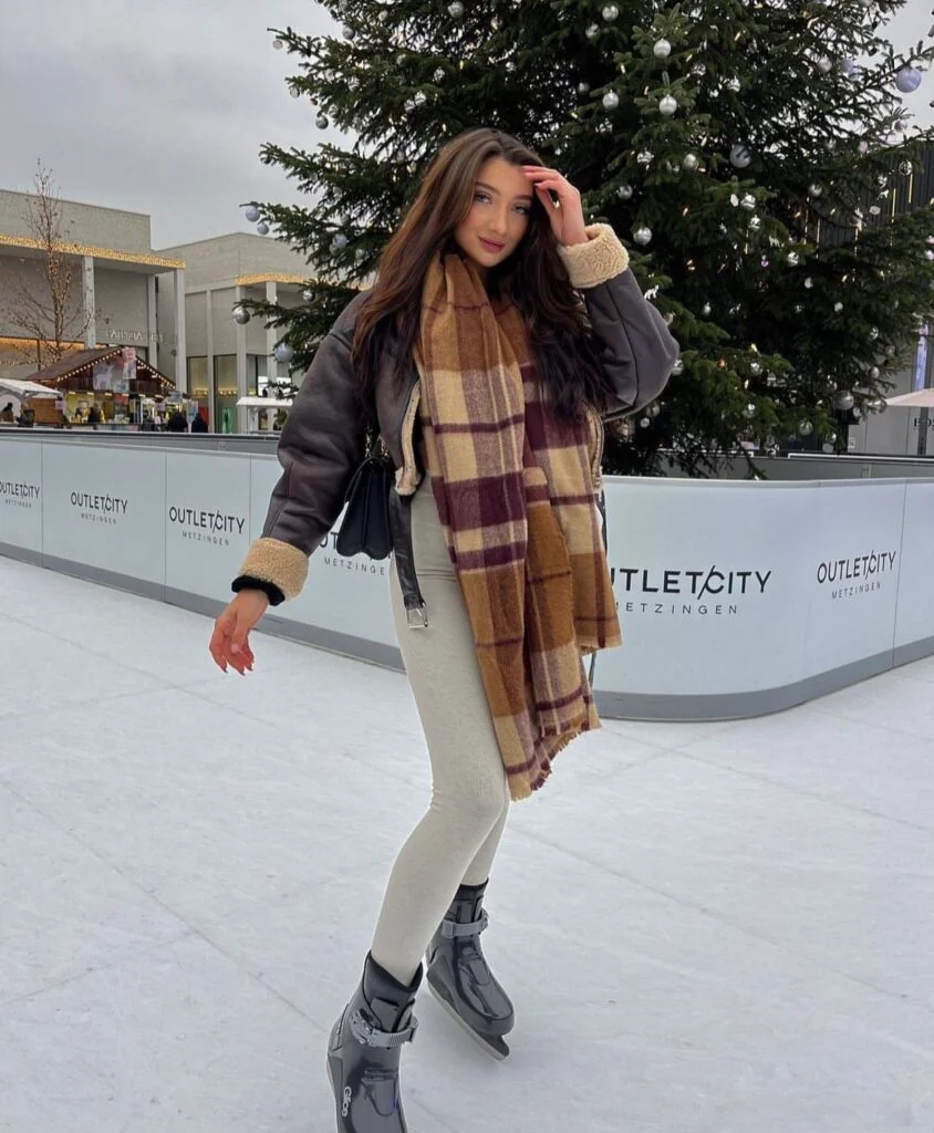 brown fur leather jacket with gray wide leg pants