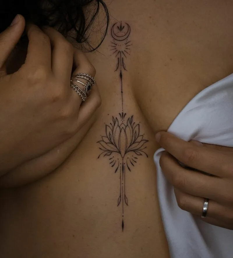 lotus middle chest tattoo