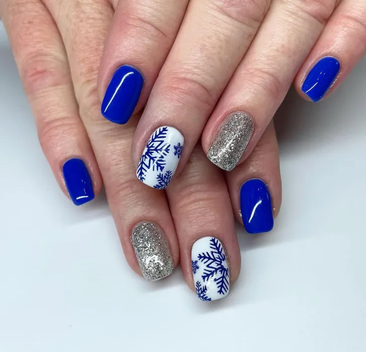 Mismatched blue short winter nail designs